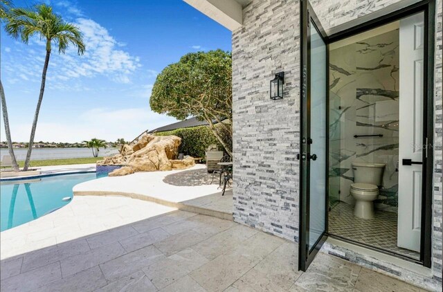 3924 SW 189th Ave, Miramar, FL 33029 - outdoor pool with a patio area and a water view