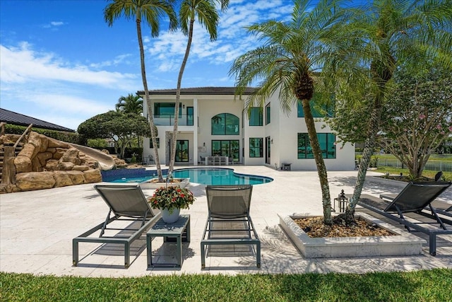 3924 SW 189th Ave, Miramar, FL 33029 - outdoor pool featuring a patio area and a water slide