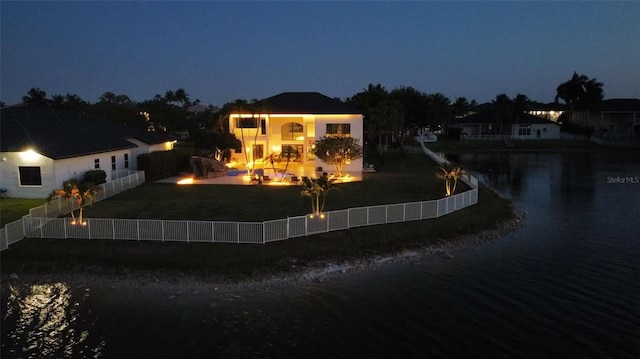 3924 SW 189th Ave, Miramar, FL 33029 - back of house at twilight with a fire pit and a water view