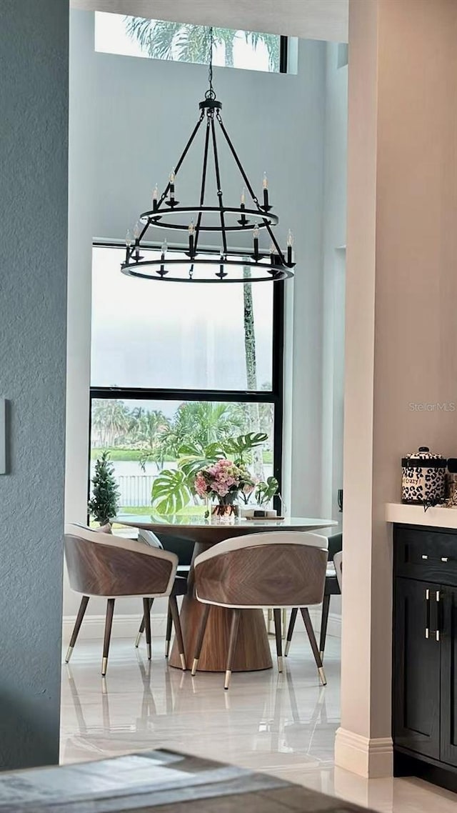 3924 SW 189th Ave, Miramar, FL 33029 - dining space with a chandelier and baseboards