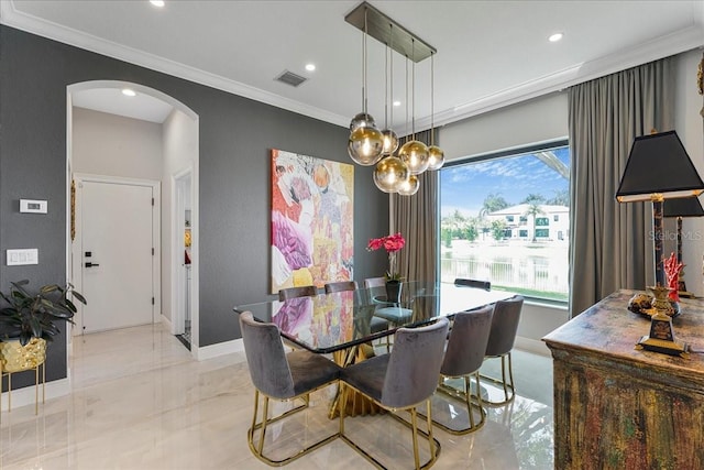 3924 SW 189th Ave, Miramar, FL 33029 - dining room featuring arched walkways, baseboards, recessed lighting, ornamental molding, and marble finish floors