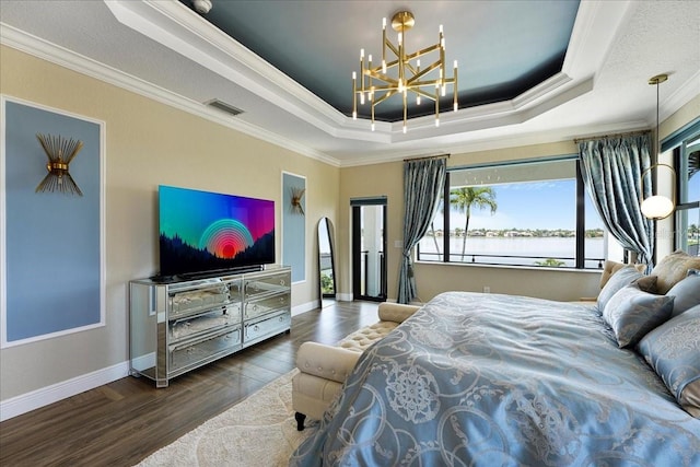 3924 SW 189th Ave, Miramar, FL 33029 - bedroom with a tray ceiling, a chandelier, ornamental molding, wood finished floors, and baseboards