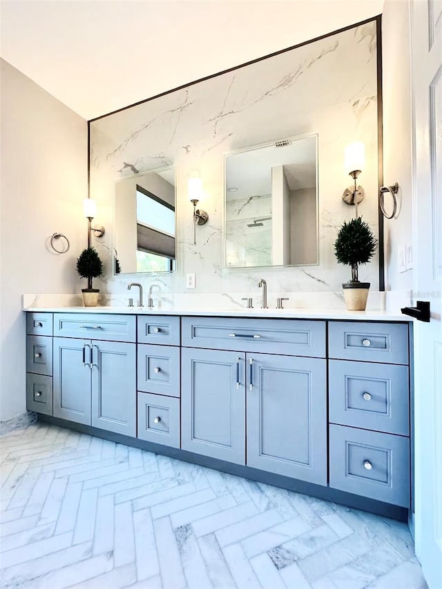 3924 SW 189th Ave, Miramar, FL 33029 - bathroom featuring double vanity and a marble finish shower