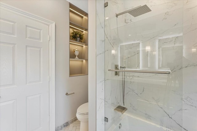 3924 SW 189th Ave, Miramar, FL 33029 - bathroom with a marble finish shower, toilet, and baseboards