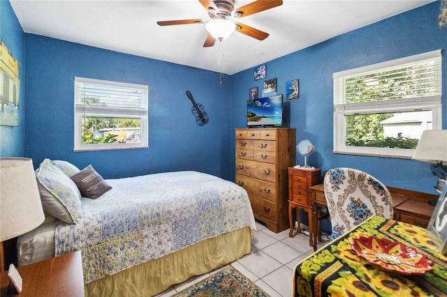 3118 Walnut St, Winter Haven, FL 33881 - tiled bedroom featuring multiple windows and a ceiling fan