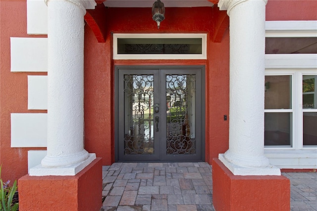 1254 Shelter Rock Rd, Orlando, FL 32835 - entrance to property featuring french doors and stucco siding
