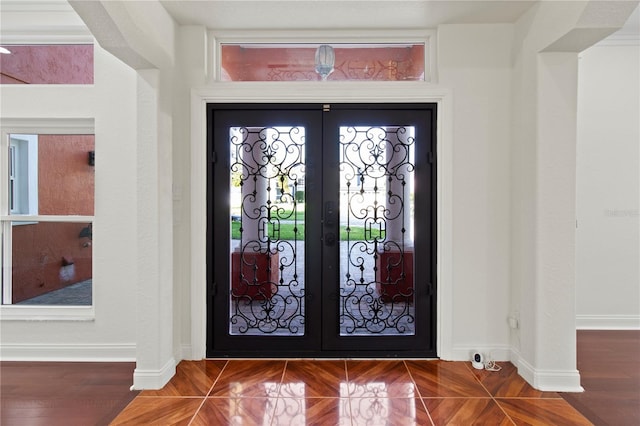 1254 Shelter Rock Rd, Orlando, FL 32835 - entrance foyer featuring french doors and baseboards