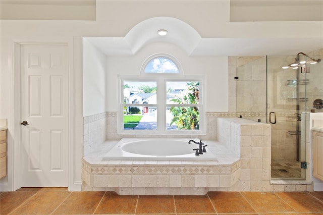 1254 Shelter Rock Rd, Orlando, FL 32835 - bathroom with a garden tub, a stall shower, vanity, and tile patterned flooring