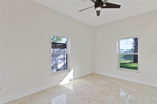 1254 Shelter Rock Rd, Orlando, FL 32835 - spare room with a ceiling fan and baseboards