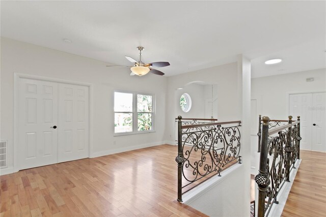1254 Shelter Rock Rd, Orlando, FL 32835 - corridor featuring an upstairs landing and light wood finished floors