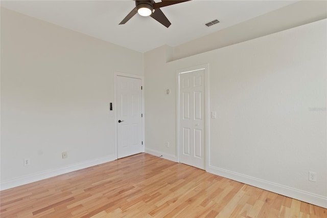 1254 Shelter Rock Rd, Orlando, FL 32835 - spare room with a ceiling fan and light wood-style floors