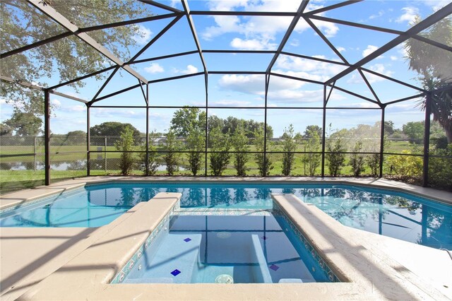 1254 Shelter Rock Rd, Orlando, FL 32835 - outdoor pool featuring a jacuzzi and glass enclosure