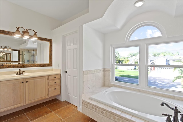 1254 Shelter Rock Rd, Orlando, FL 32835 - bathroom with a garden tub, vanity, and tile patterned floors