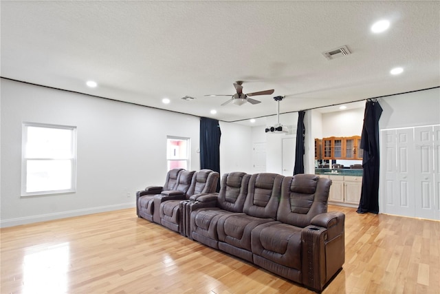 1254 Shelter Rock Rd, Orlando, FL 32835 - cinema featuring ceiling fan, light wood finished floors, and recessed lighting