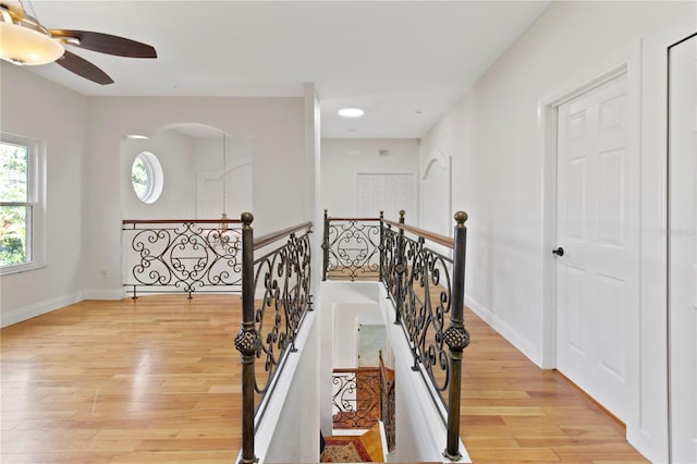 1254 Shelter Rock Rd, Orlando, FL 32835 - corridor featuring an upstairs landing and light wood-style floors
