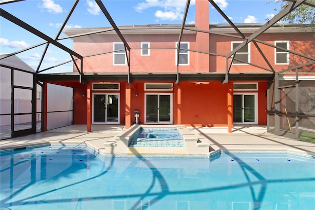 1254 Shelter Rock Rd, Orlando, FL 32835 - swimming pool with an in-ground hot tub, a patio, and a lanai