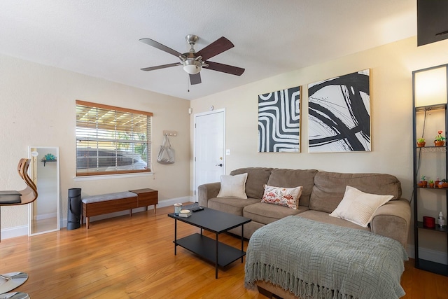 2272 Raeford Rd Unit A-3, Orlando, FL 32806 - living area with a ceiling fan, baseboards, and wood finished floors