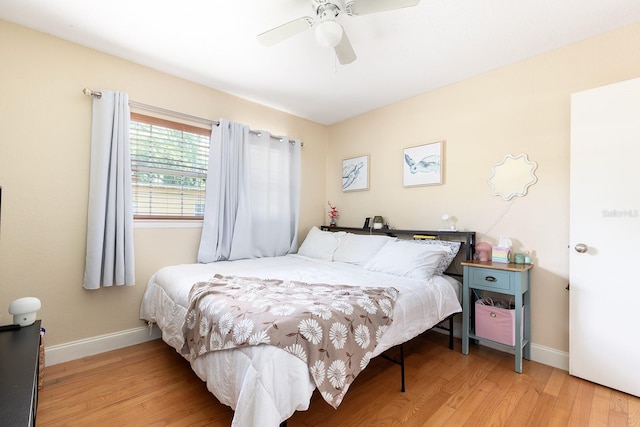 2272 Raeford Rd Unit A-3, Orlando, FL 32806 - bedroom featuring light wood-type flooring, baseboards, and a ceiling fan
