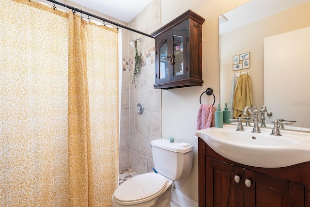 2272 Raeford Rd Unit A-3, Orlando, FL 32806 - full bath featuring toilet, a tile shower, and vanity