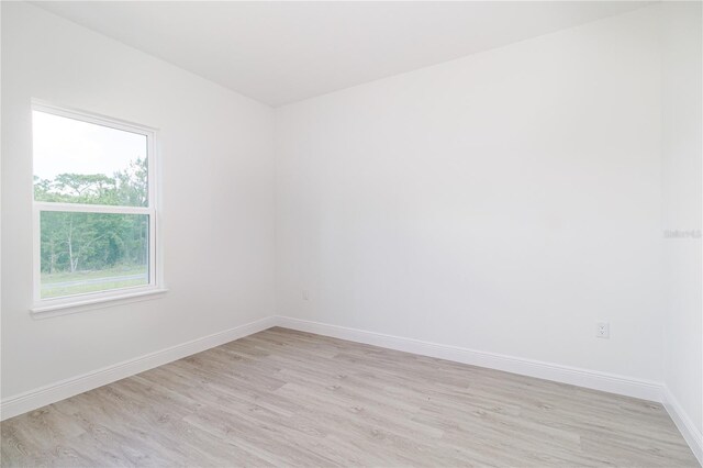 7229 N Gibralter Dr, Citrus Springs, FL 34434 - empty room featuring light wood finished floors and baseboards