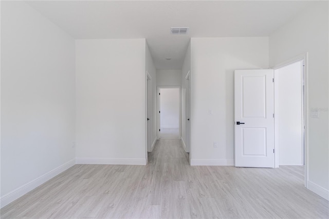7229 N Gibralter Dr, Citrus Springs, FL 34434 - empty room with light wood-style flooring and baseboards