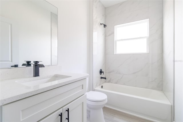 7229 N Gibralter Dr, Citrus Springs, FL 34434 - bathroom with toilet,  shower combination, vanity, and wood finished floors