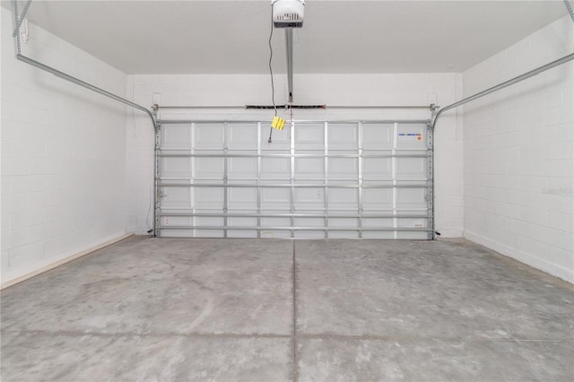 7229 N Gibralter Dr, Citrus Springs, FL 34434 - garage with concrete block wall and a garage door opener