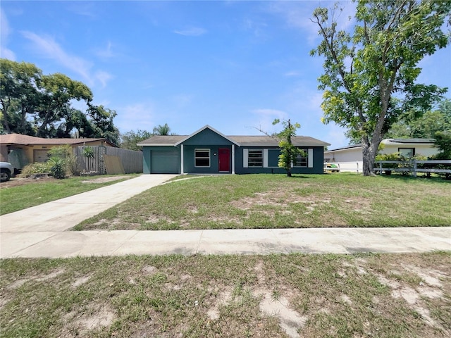 single story home featuring an attached garage and driveway