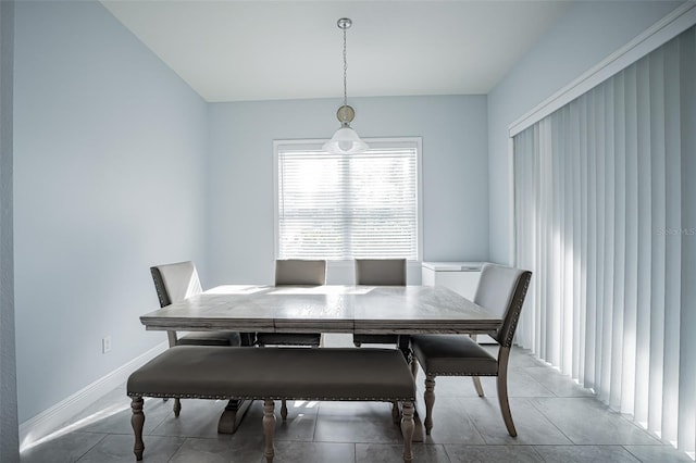 dining space with baseboards