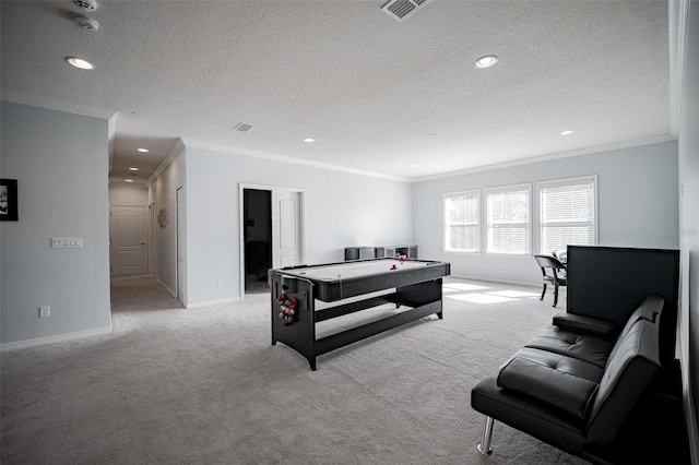 playroom featuring light colored carpet, crown molding, baseboards, a textured ceiling, and recessed lighting