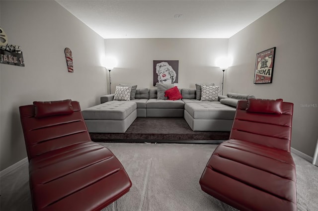 living room with carpet and baseboards