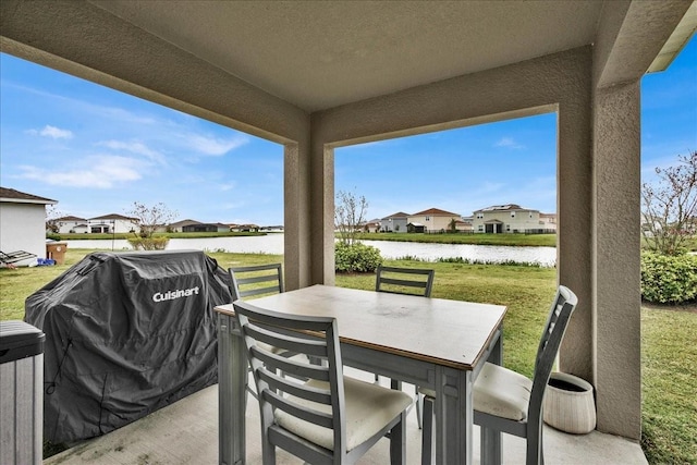 356 Quarry Rock Cir, Kissimmee, FL 34758 - view of patio featuring a water view, a residential view, and outdoor dining space