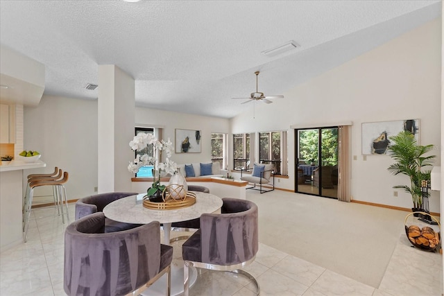 2652 Bent Hickory Cir, Longwood, FL 32779 - dining space featuring ceiling fan, baseboards, a textured ceiling, carpet floors, and vaulted ceiling