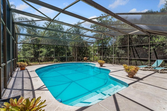 2652 Bent Hickory Cir, Longwood, FL 32779 - swimming pool featuring a patio area and glass enclosure
