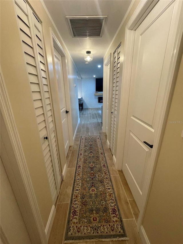 9153 86th Ave, Seminole, FL 33777 - hall with wood finished floors