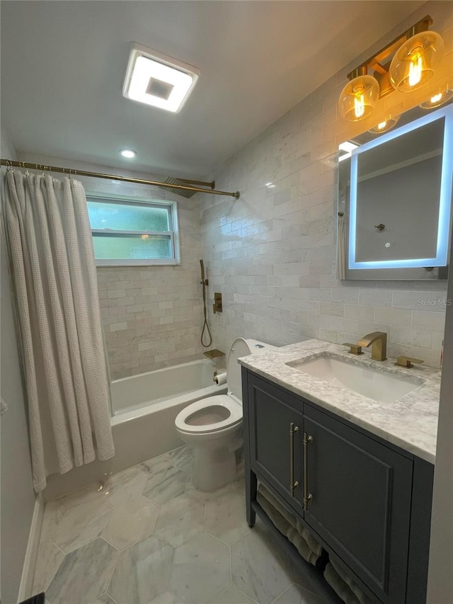 9153 86th Ave, Seminole, FL 33777 - bathroom with shower / bath combo, toilet, vanity, and tile walls