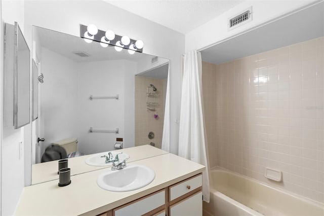 3900 Southpointe Dr Unit 127, Orlando, FL 32822 - full bathroom with toilet, vanity, and shower / tub combo