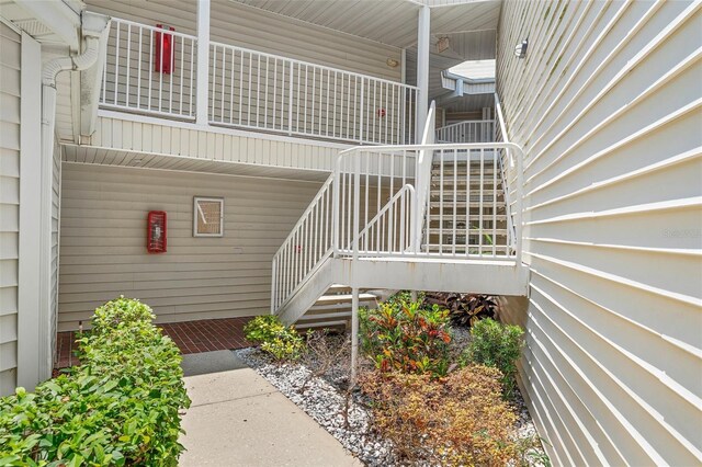 3900 Southpointe Dr Unit 127, Orlando, FL 32822 - view of property exterior with stairway