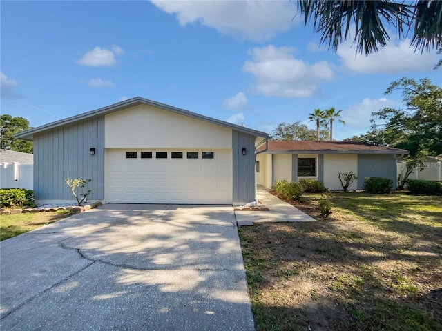 6623 Baybrooks Cir, Temple Terrace, FL 33617 - view of front facade with concrete driveway and a garage