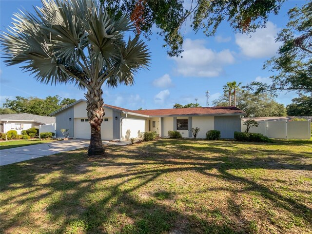 6623 Baybrooks Cir, Temple Terrace, FL 33617 - ranch-style house with an attached garage and concrete driveway