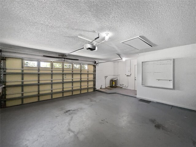 6623 Baybrooks Cir, Temple Terrace, FL 33617 - garage featuring a garage door opener