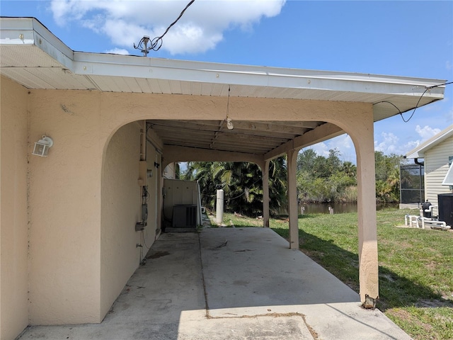 155 Summerset Dr, Punta Gorda, FL 33982 - view of parking with a carport and a water view