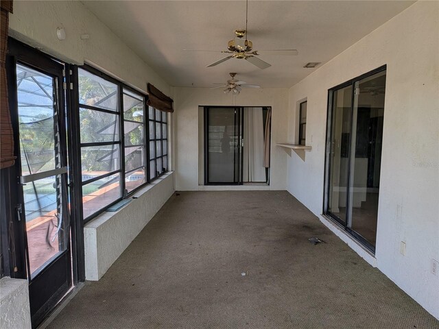 155 Summerset Dr, Punta Gorda, FL 33982 - unfurnished sunroom with carpet flooring and a ceiling fan