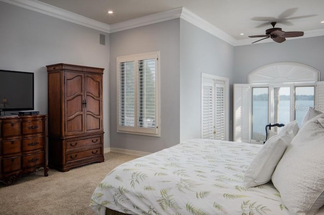 9724 Chestnut Ridge Dr, Windermere, FL 34786 - bedroom with light carpet, multiple windows, recessed lighting, access to exterior, and ornamental molding