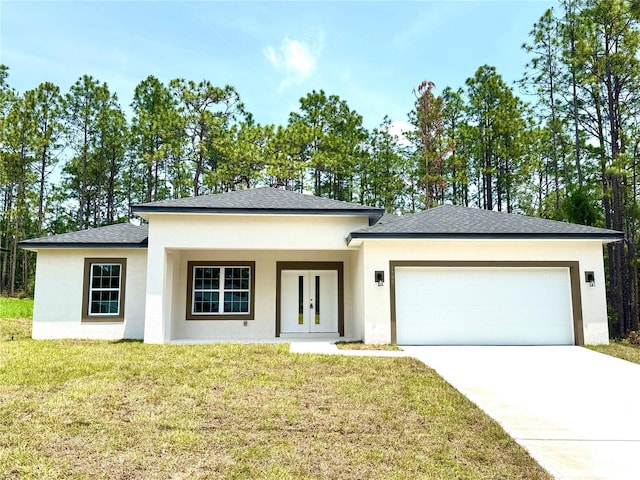 1795 W Linden Dr, Citrus Springs, FL 34434 - prairie-style house with a garage, stucco siding, french doors, driveway, and a front lawn