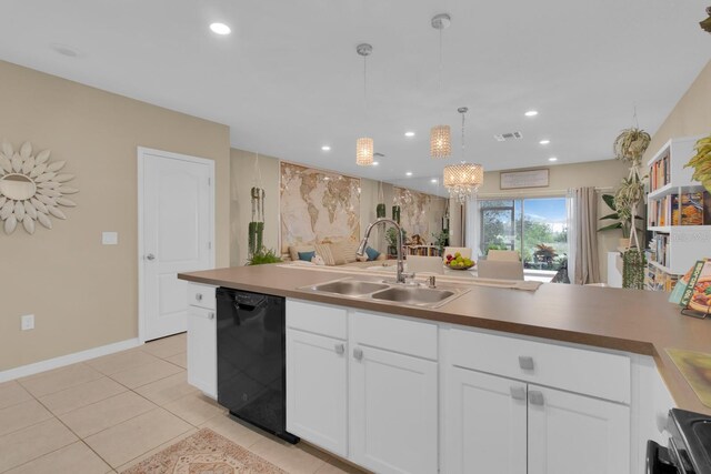 316 Primrose Dr, Davenport, FL 33837 - kitchen featuring dishwasher, a sink, decorative light fixtures, recessed lighting, and white cabinetry