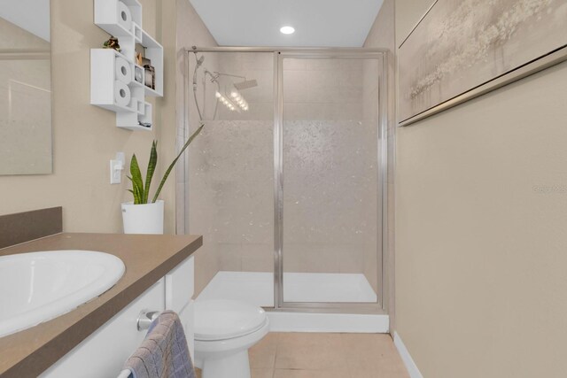 316 Primrose Dr, Davenport, FL 33837 - bathroom featuring tile patterned flooring, a stall shower, vanity, toilet, and recessed lighting