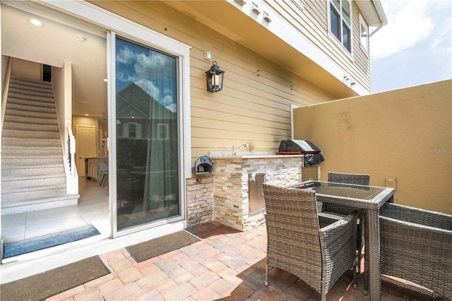 view of patio with outdoor dining area