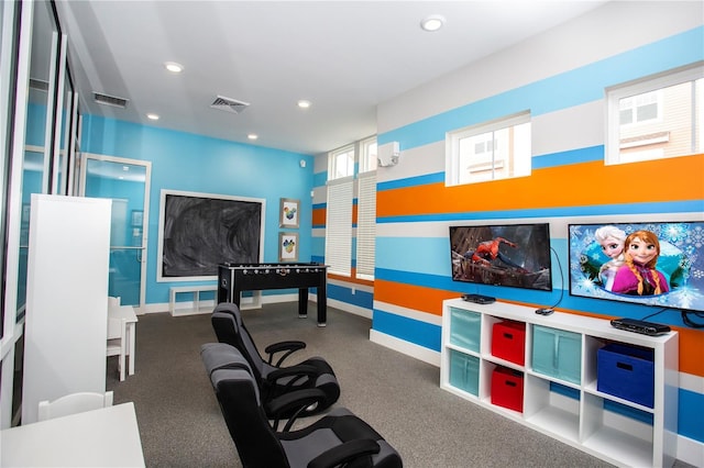 playroom featuring recessed lighting and baseboards