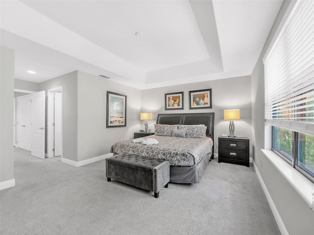 8215 Roseville Blvd, Davenport, FL 33896 - bedroom with light colored carpet, baseboards, and a tray ceiling